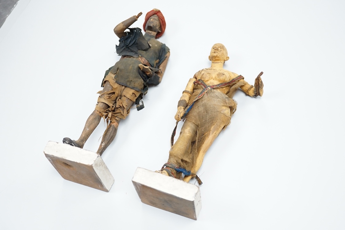 Two Indian clay figures, 26cm high
